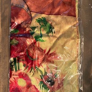 Silk scarf still in packaging.